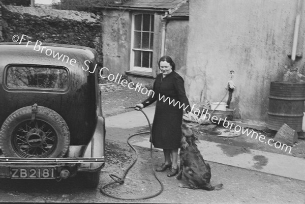 ESTHER MURPHY WASHING CANON'S CAR